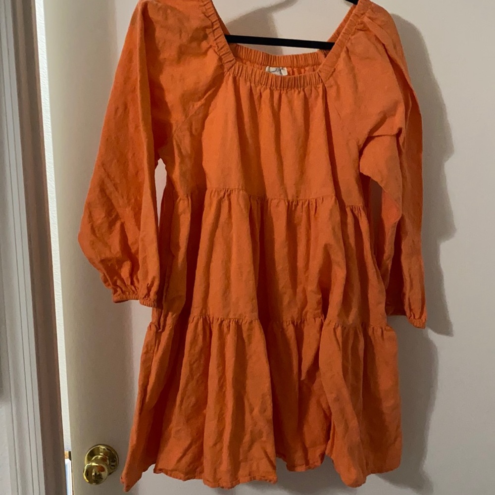 Peach colored off or on shoulder